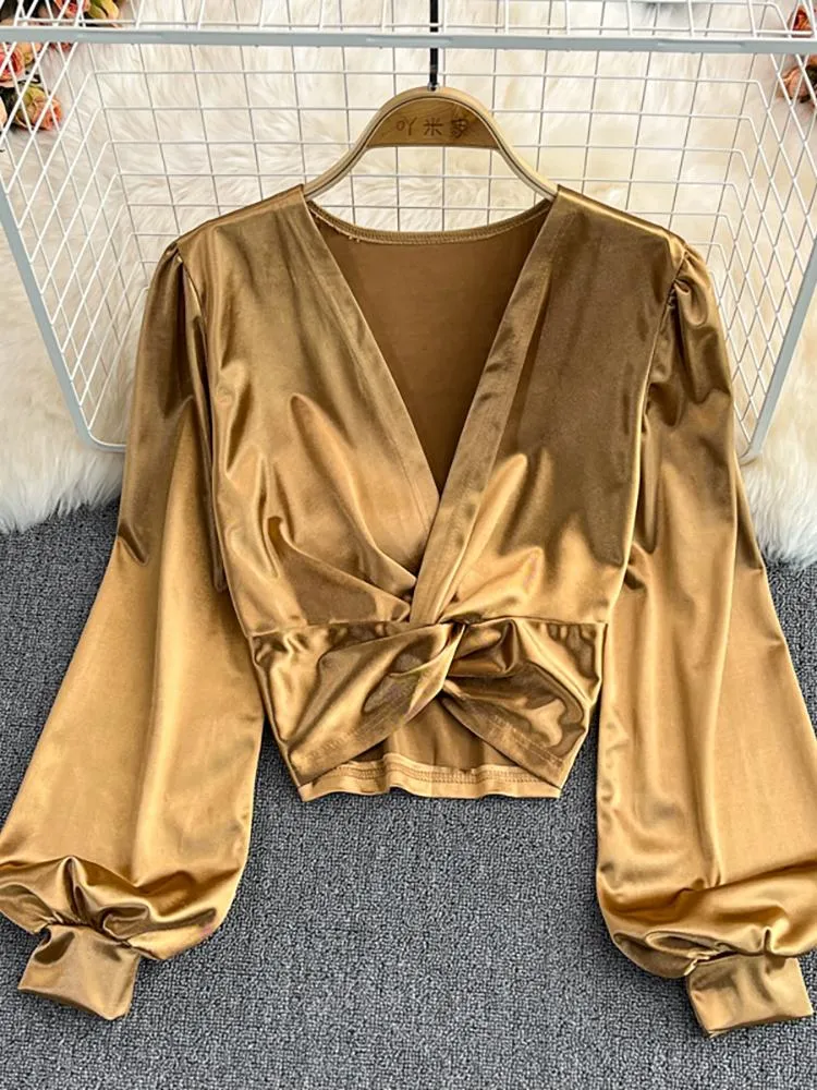 Blusa oro sales