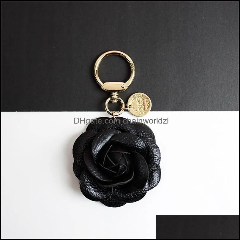 camellia flower keyrings bag charms pu leather pendant car key chains accessories black white rose red jewelry keychains rings holder for