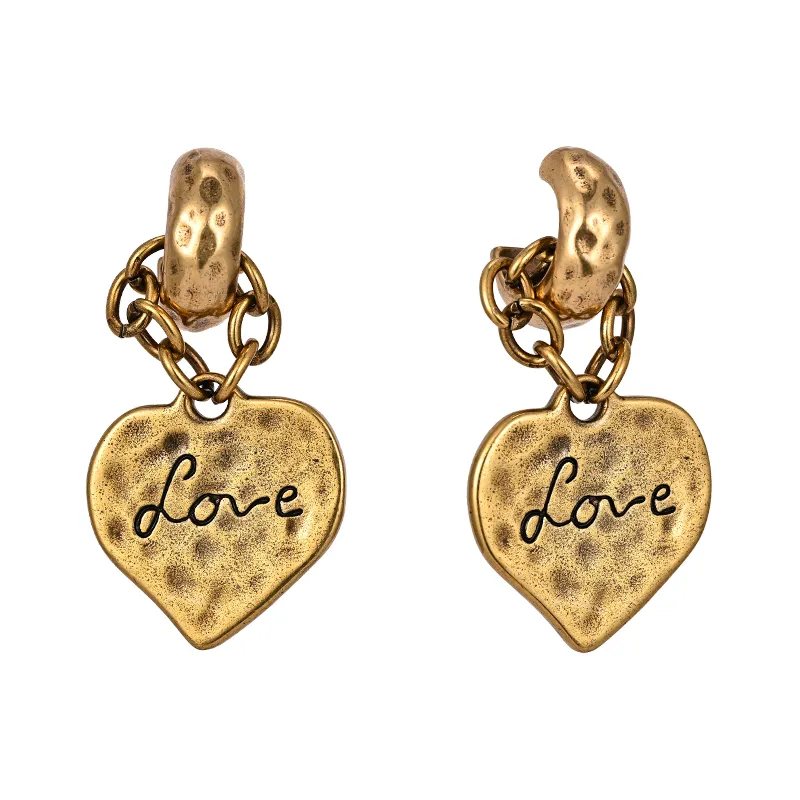 Bump texture love pêche coeur boucles d'oreilles étalons rétro tempérament haut de gamme marée de mode cool fashion street tout-correspondant bijoux accessoires