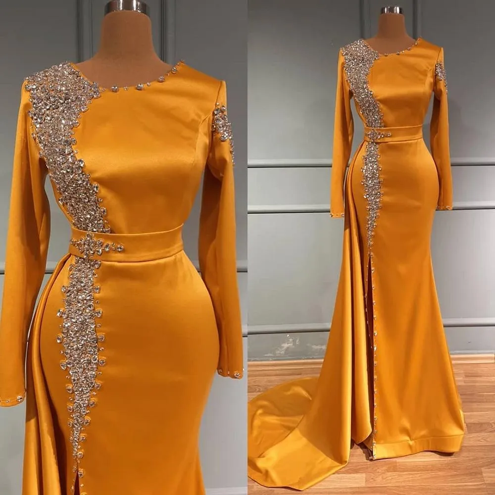 2022 Sexy African Orange Mermaid Evening Dresses Wear Long Sleeves Jewel Neck Silver Crystal Beading Side Split Special Occasion Prom Party Gowns Vestidos De Novia