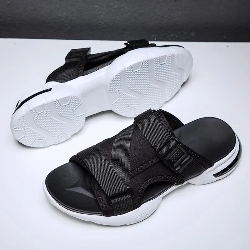 Sandaler män sommarskor Sandalias Homens Herrens skor ihåliga andningsbara strand Sandalhas Masculina platt gummiandaler