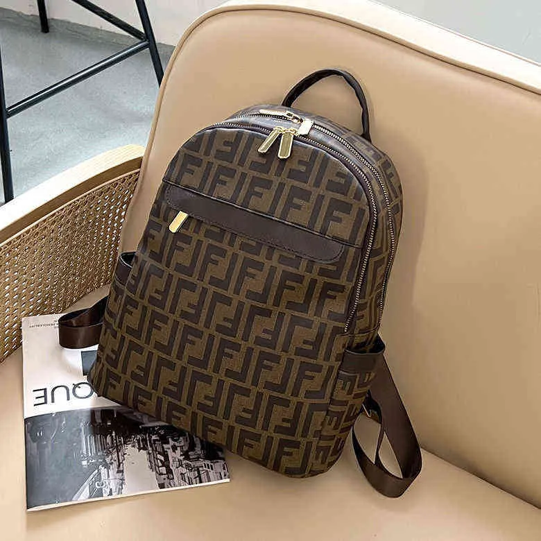 Mochila estampada premium feminina 2022 novo lazer grande capacidade Mochila de viagem versátil bolsa escolar de couro macio