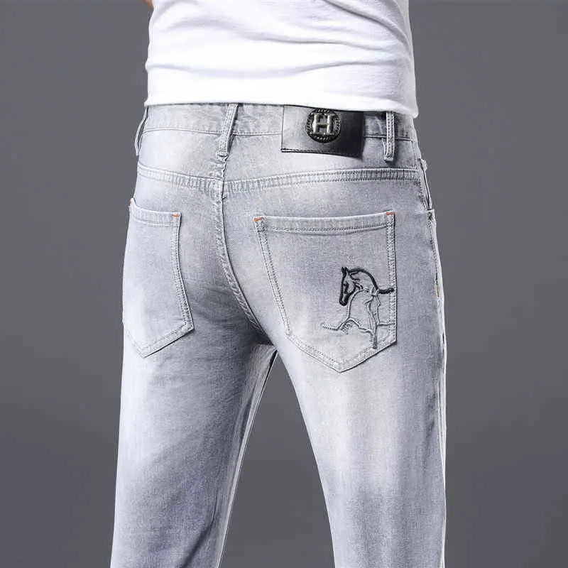 Męski designer dżinsów Wysokiej klasy haftowany letni cienki styl prosta moda Slim Fit Elastic Proste spodnie M2PZ