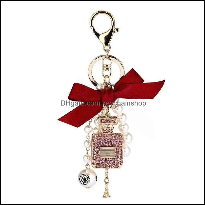 creative handmade diy diamond perfume bottle accessories alloy bow pearl luxury keychain purses charm pendant ys068