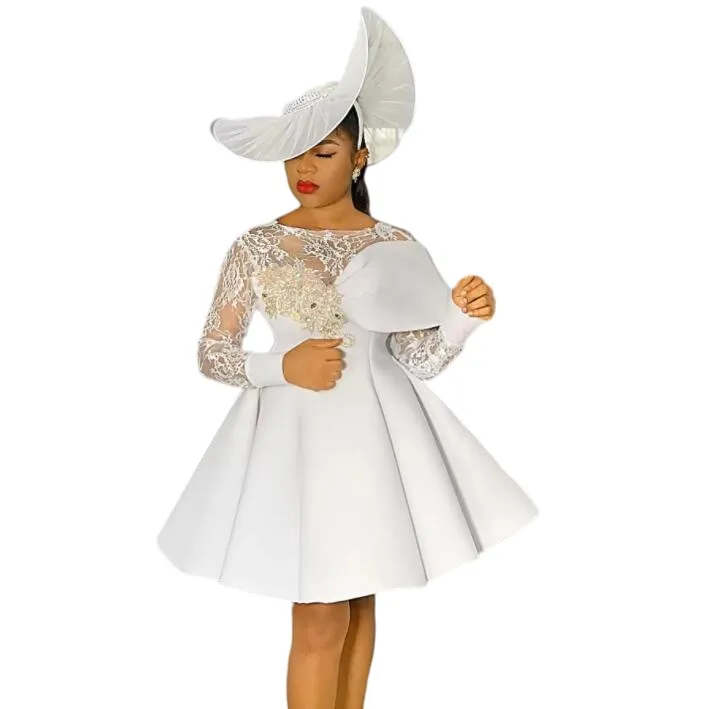Short White Winter White Cocktail Dress with Sheer Neckline, Beaded Appliques, and Long Sleeves - Perfect for Prom, Formal Parties, or Aso Ebi Short White Winter White Cocktail Dress with Sheer Neckline, Beaded Appliques, and Long Sleeves - Perfect for Prom, Formal Parties, or Aso Ebi
