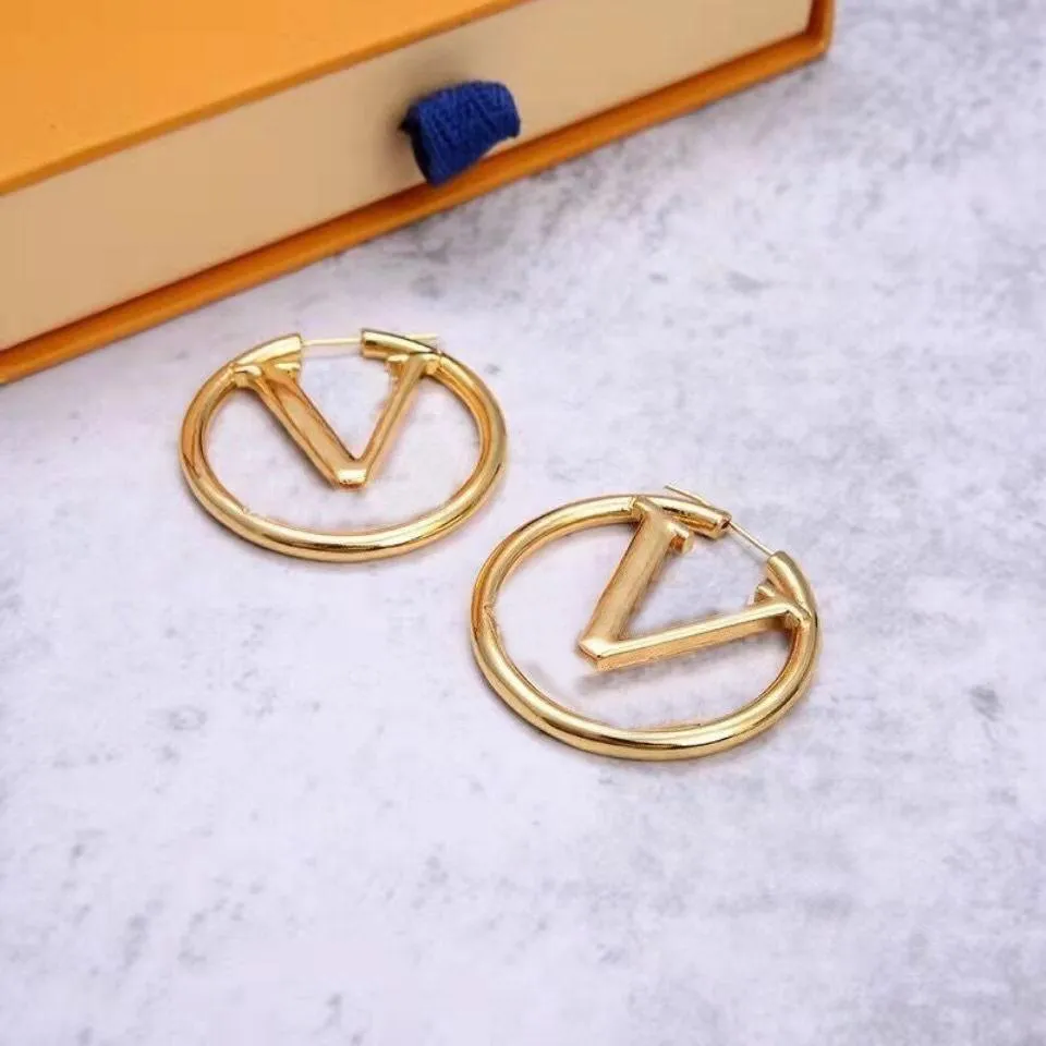 Designer sales huggie earrings