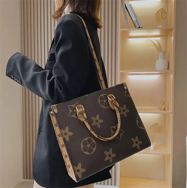 Grande capacité fourre-tout mode Femme en cuir Designers sacs à bandoulière femme sac à main poignée dame sac à provisions sac de créateur de luxe H0269