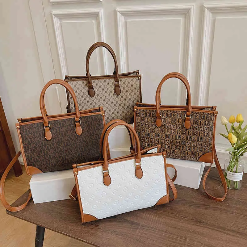 Designer bag Handbag trendy bags customized women`s advanced sense splicing large capacity Tote office hand-held
