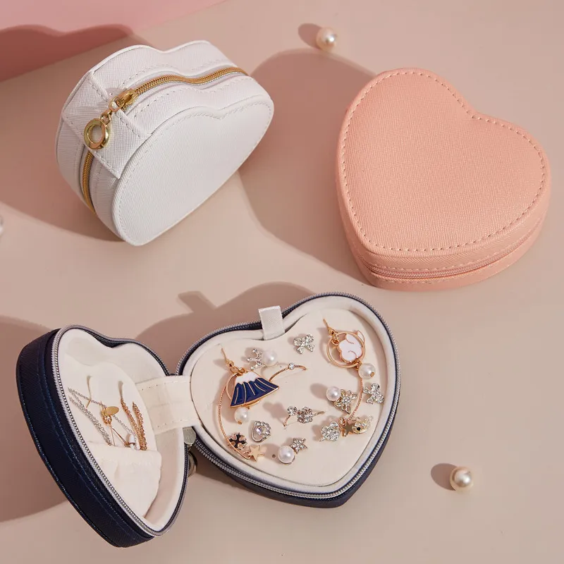 Caja de almacenamiento de joyas de viaje portátiles Cabecillo de cuero de cuero en forma de corazón creativo Cabecillo