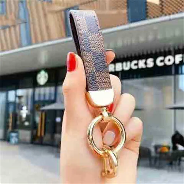 Stylish Brown PU Leather Leather Keychain For Men And Women Perfect Key  Ring Holder From Accessorie8986, $19.1