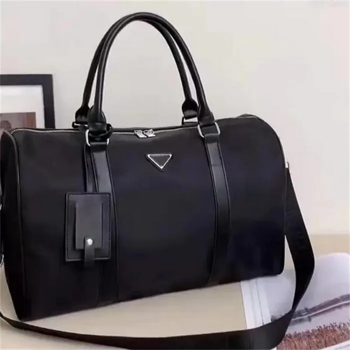 Mode shopping väskor lyxväska nylon duffle väska män kvinnor handväska designer axel tote toppkvalitet stor strand ba gs lyxys reser crossbody purses svart