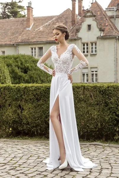 Charmant nouveau designer robes de mariée à manches longues 2019 en dentelle sexy ouverte arrière longueur de plancher