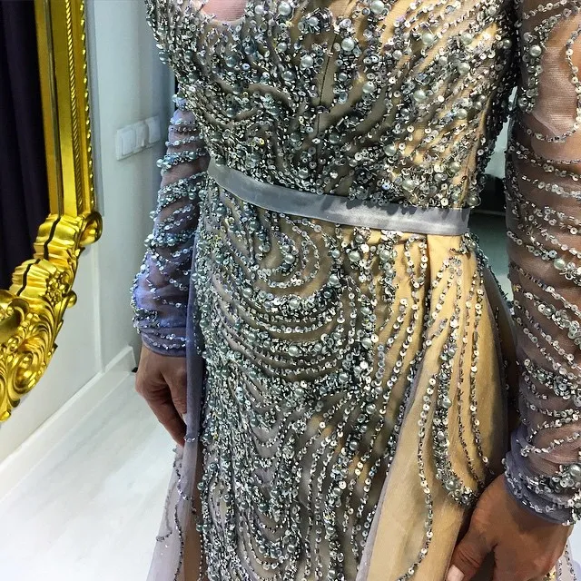 Paillettes di perline di lusso aline maniche lunghe splendide abiti da sera con illuso a fascia illusione posteriore abito da ballo sexy da ballo da ballo.