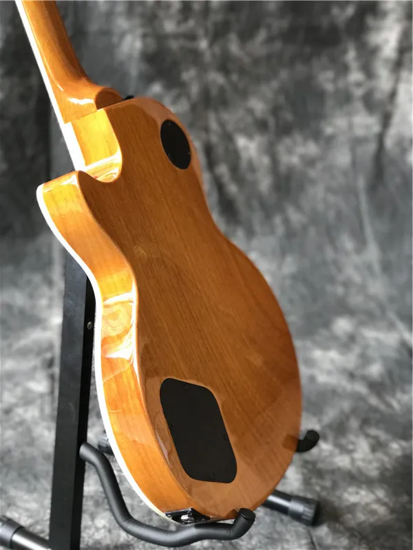 New slas Guitarra Elétrica com marrom explosão Flame Maple, dois captadores de Zebra, com hardware cor preta guitarra