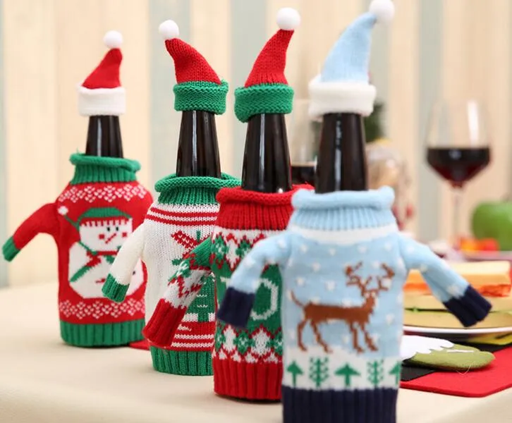 Il Natale di alta qualità decora i set di bottiglie di maglione per maglieria con birra e vino rosso coprono il ristorante dell'hotel per famiglie utilizzato