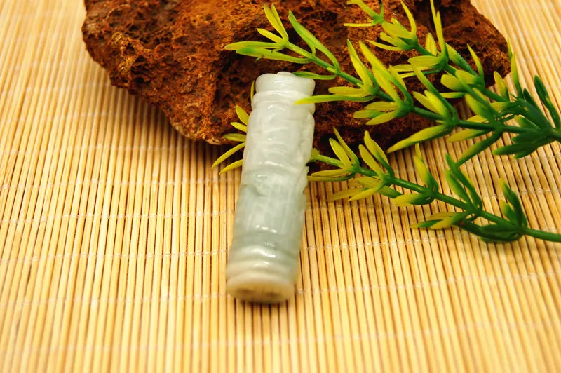 Hand-carved natural jade auspicious dragon column amulet. Lucky necklace pendant.