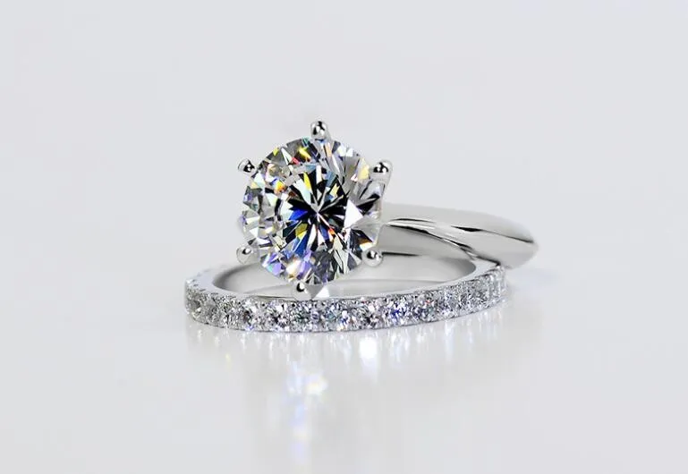 Christamsギフトスタンニングラグジュアリージュエリー925スターリングシルバー輝くラウンドカットホワイトトパーズCZダイヤモンドパーティー女性の結婚式の婚約指輪