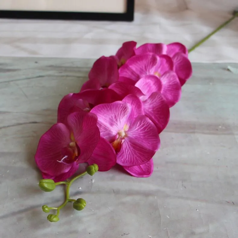 Commerci all'ingrosso Moth Orchid fiore farfalla orchidea fiore artificiale decorazioni di nozze a casa centrotavola sullo sfondo della tavola di nozze