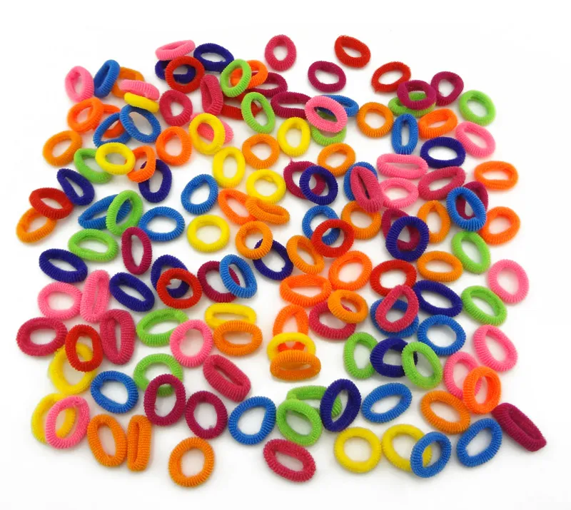 Commercio all'ingrosso 500 pezzi colorati bambini bambini titolari di capelli elastici carini elastici capelli accessori ragazza donna charms cravatta gomma