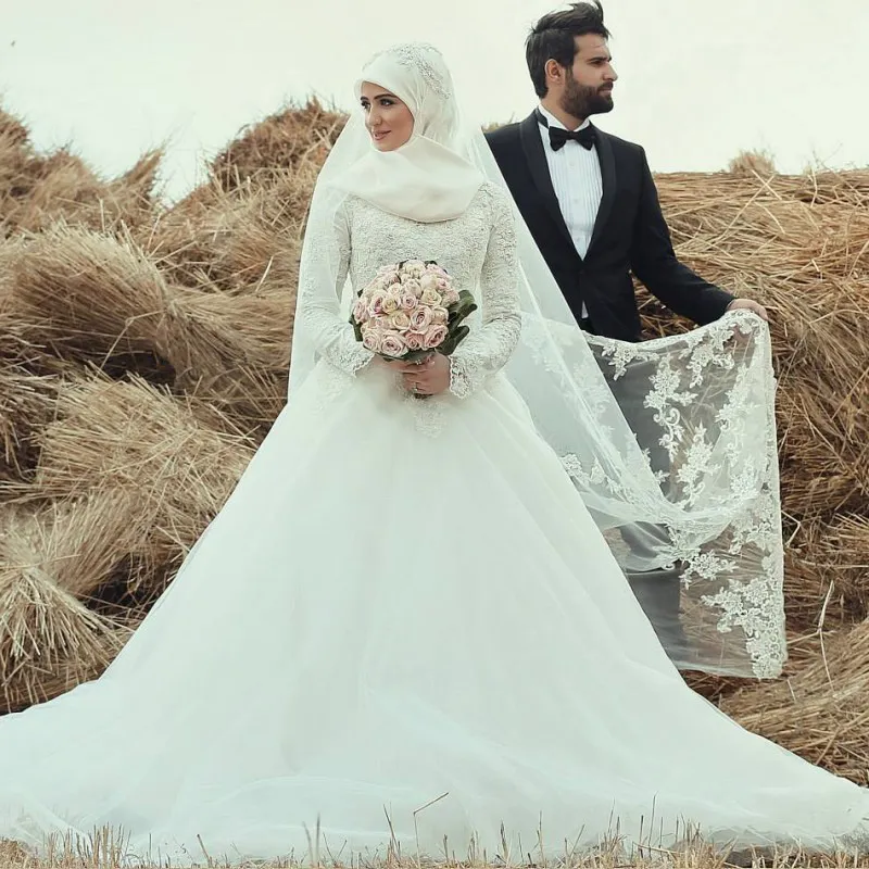 Robe de mariée musulmane modeste une ligne col rond manches longues robes de mariée dentelle perlée appliques gonflé jupe en tulle ceinture arc sur mesure