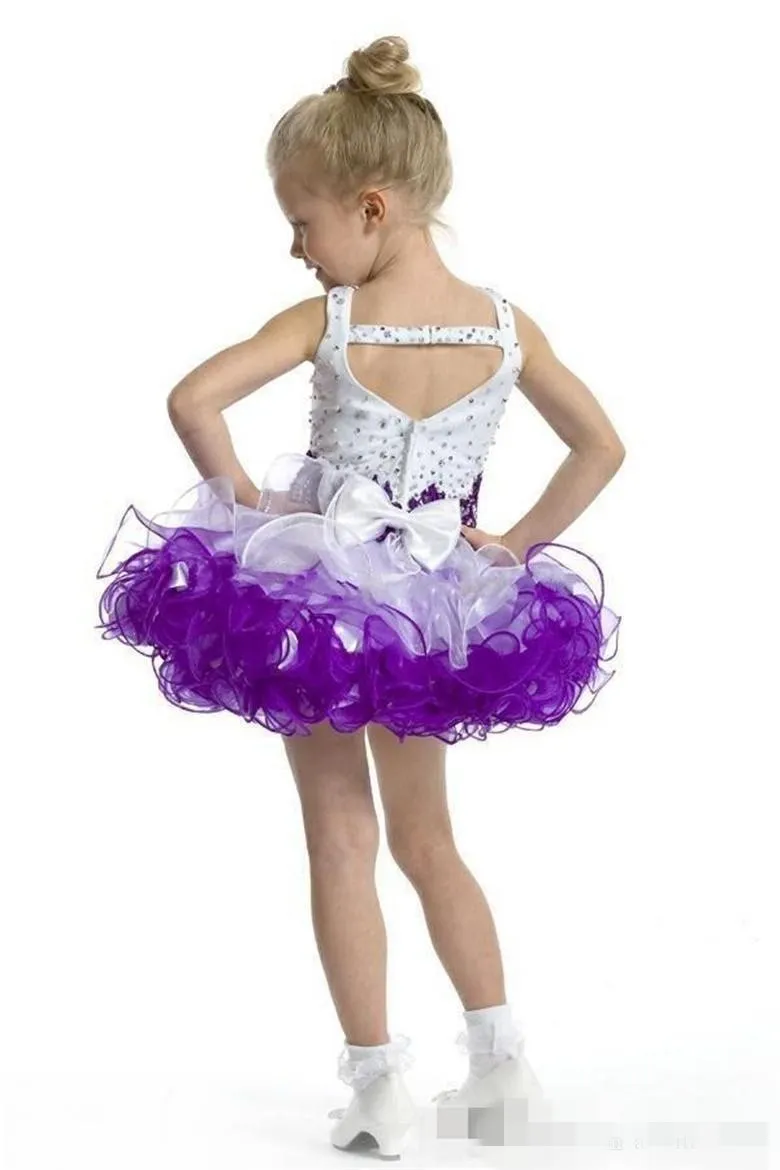 2019 Custom Glitz Cupcake Girl Pageant Vestes Coscopi do garoto de espaguete com cristal roxo de miçangas e branco com Bow Kids Prom Ball3255770