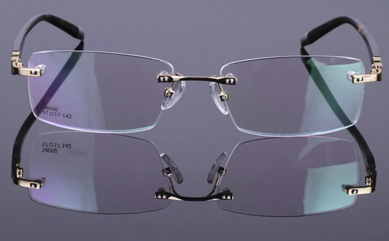 Kwaliteit goedkope brilmontuur randloos rechthoekig frame schildpad plank benen drie kleuren brillen voor mannen 580504017798