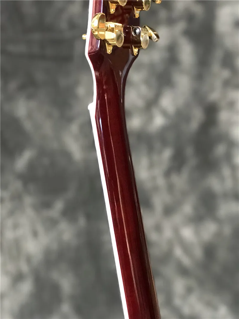 strumento musicale di alta qualità di vendita calda chitarra elettrica personalizzata di colore rosso con tastiera in palissandro e hardware color oro