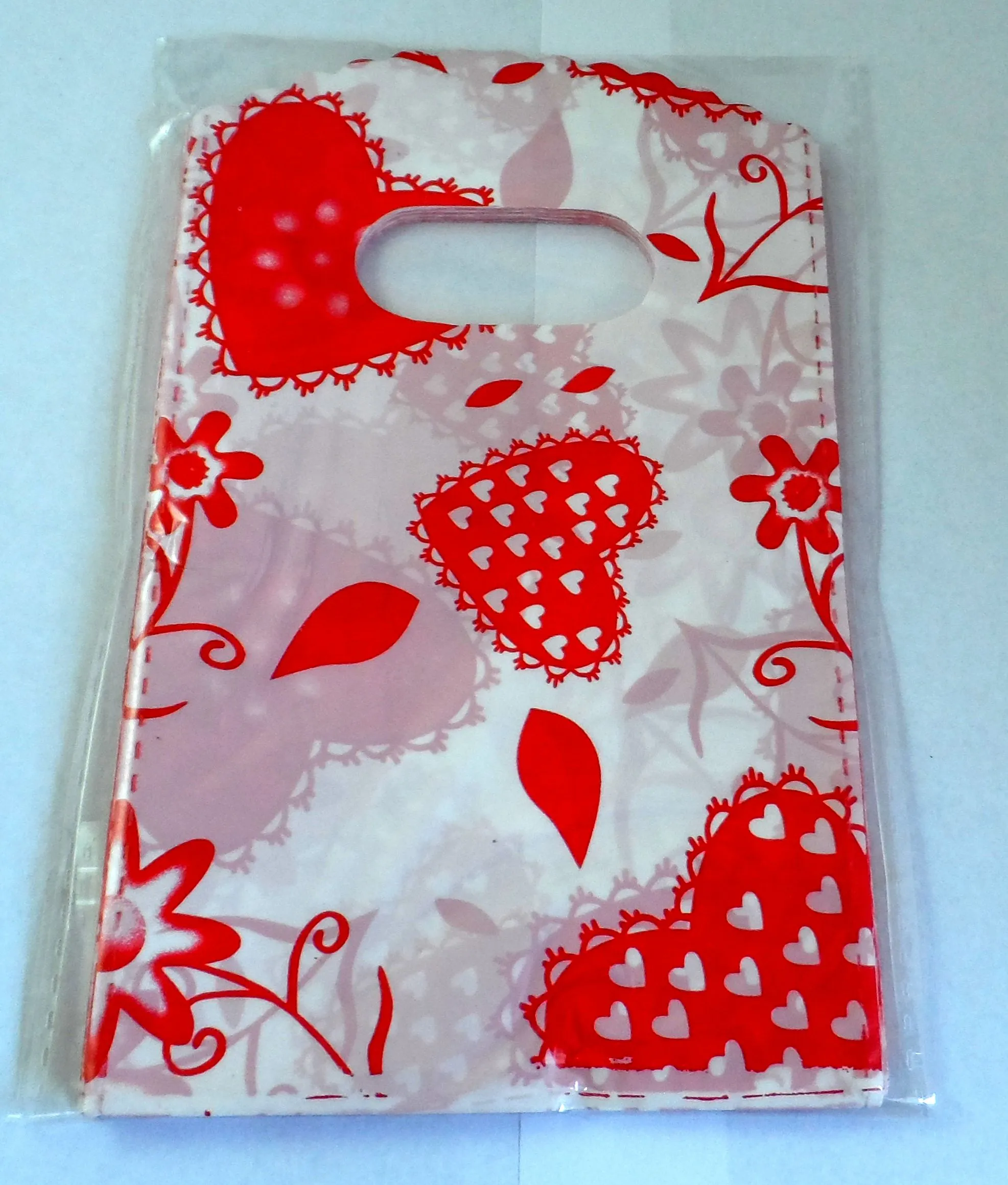 Free Shipping New 500pcs Shopping Peace Heart Plastic Packing Gift Bag 15x9cm HOT