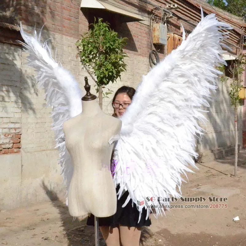 Lo spettacolo teatrale del partito cosplay delle ali di piuma d'angelo bianco di alta qualità di lusso adulti fornisce ali di stelle Visualizza oggetti di scena spedizione gratuita EMS