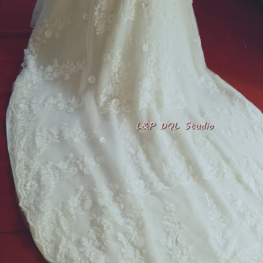 Robes de mariée robe de bal en dentelle de luxe Photos réelles LP DQL Studio Robes de mariée sans bretelles à lacets dos Cathédrale Train avec broderie de perles