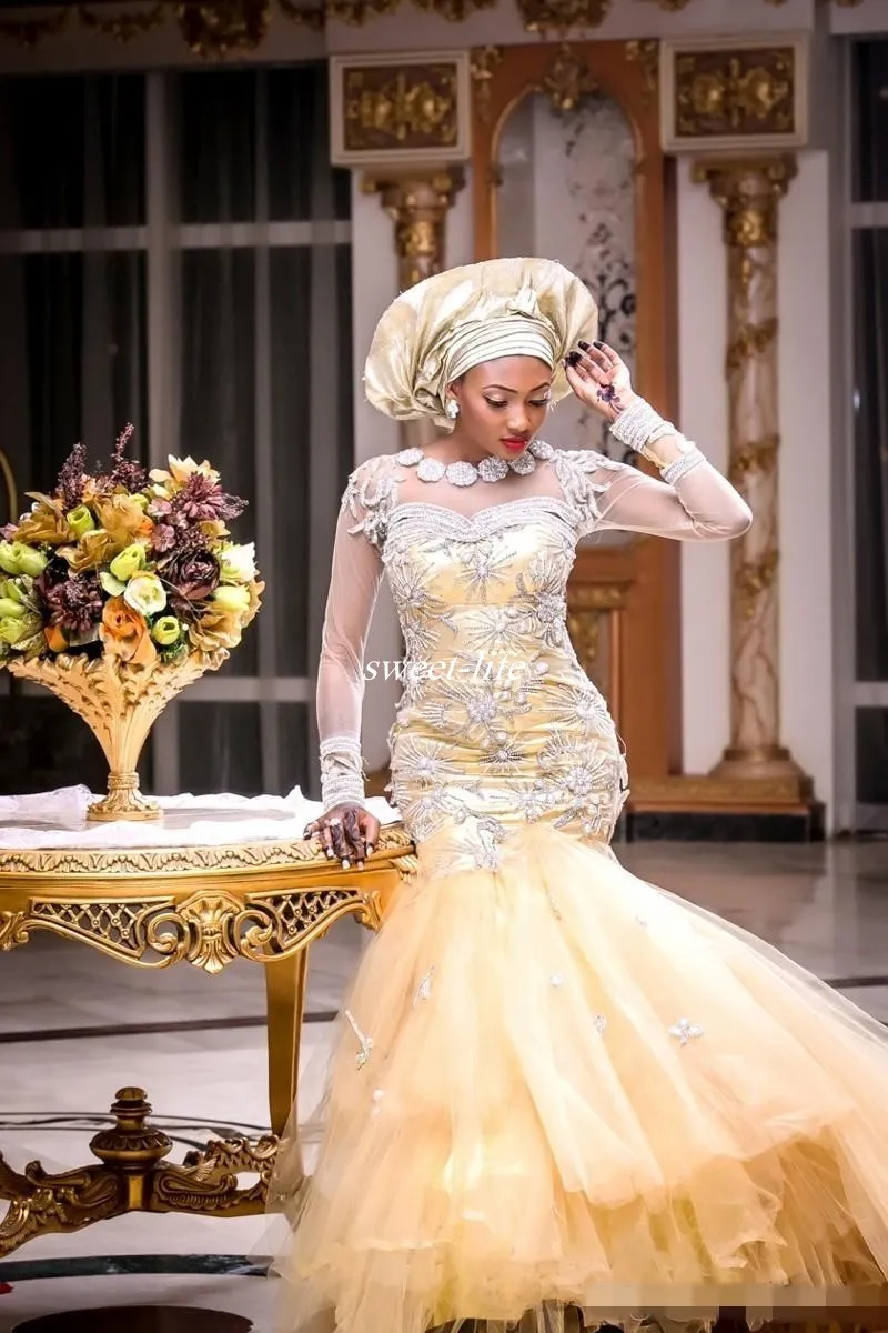 Африканские традиционные свадебные платья Нигерия Золотые свадебные платья 2019 хрустальные бусы ясных тюль длинные рукава русалка свадебное платье плюс размер