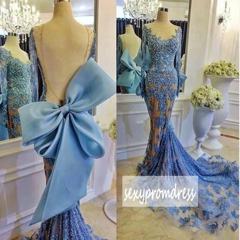 Amazing Blue Lace Mermaid Prom Dresses 2017 Long Sleeve Sexy Backless With Big Bow Evening Gowns Sweep Train Arabic Formal Party Dresses