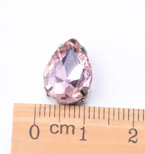 Gratis shippment! 35st / parti 10x14mm Kristallknappar Teardrop Shape Glas i vit k Metallklininställningar Sy på klädskor