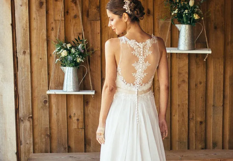 Custom-made Ivory Chiffon boho lace wedding dress with Scoop Buttons, Back Applique, and Beads