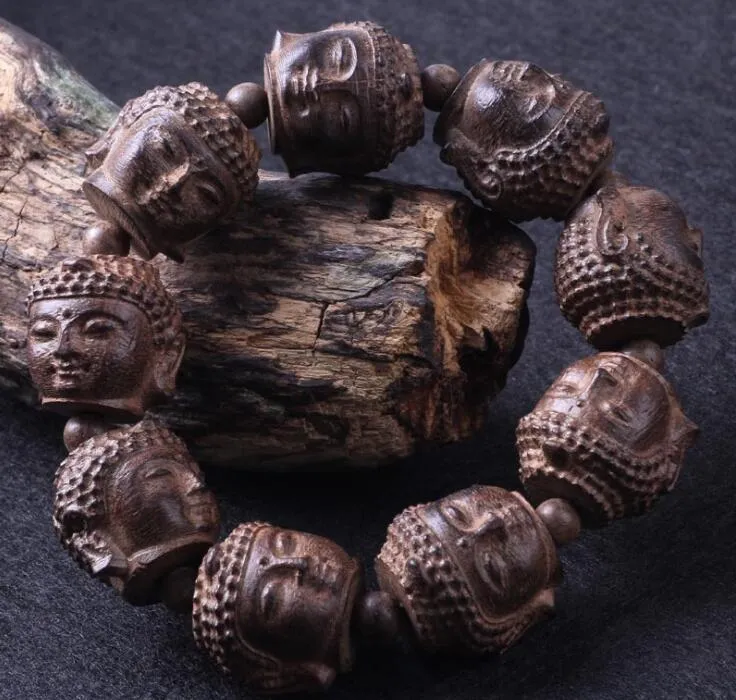 Perles en bois de sandale Gravure à main Shakya Muni Bouddha Bouddha Head Bracelet à la main Bouddha en bois