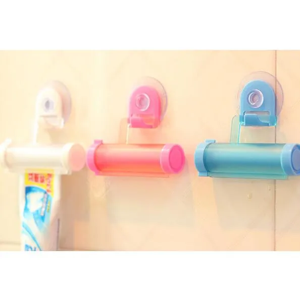 New Colorful Plastic Tube Rolling Toothpaste Squeezer Dispenser Hook Holder Sucker Hanging Bathroom Wall