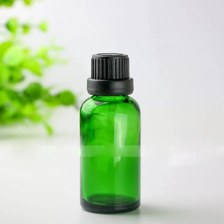 Vente chaude 30ml bouteilles en verre vert avec bouchon à l'épreuve des enfants bouchons à vis huile essentielle cosmétique vide flacons compte-gouttes en verre 30ml en stock