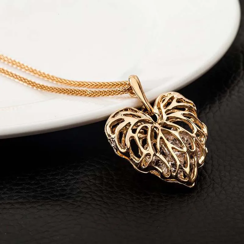 Hollow Gold Love Leaf With Shiny Zirkoon Ketting Hanger Lange Ketting Legering Goud Zilver Trui Keten Ornamenten Kleding Accessoires
