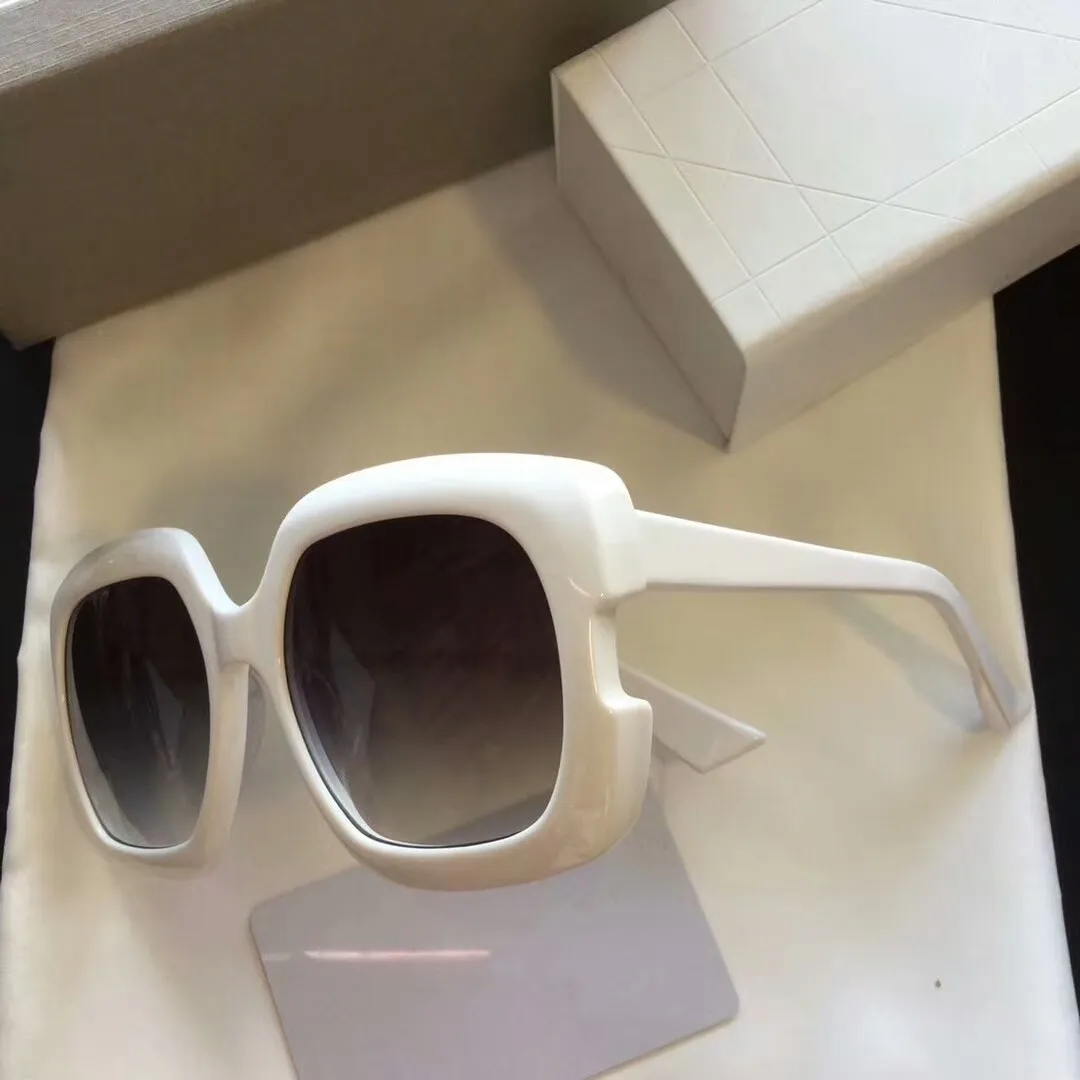 Sonnenbrillen für Männer und Frauen Designer Sommerstil 004s Anti-Ultraviolett-Retro-Platten-Quadrat-Vollbild-Mode-Zufallskasten