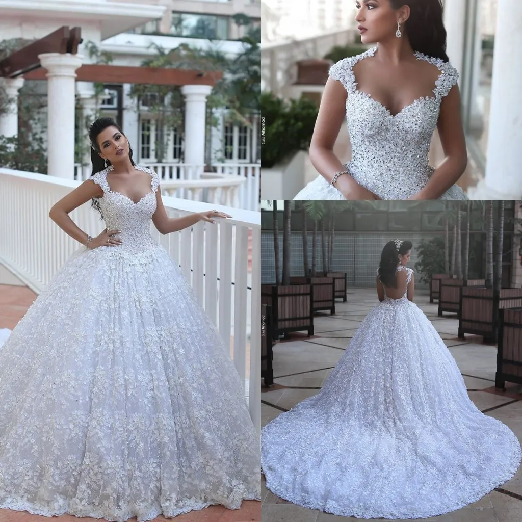 Luxury Ball Gown Illusion Tillbaka Bröllopsklänningar sa Mahamaid Sweetheart Cap Sleeves Arabiska Beaded Lace Appliques Novia Bridal Gowns