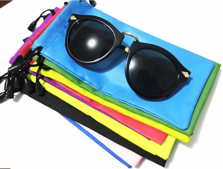 Livraison gratuite Durable étanche à la poussière en plastique lunettes de soleil pochette souple lunettes sac étui à lunettes lunettes accessoires 100 pièces