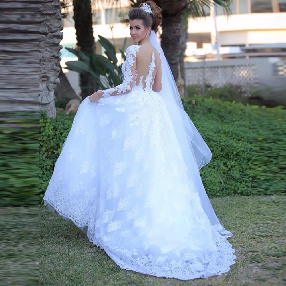 Abiti da sposa a maniche lunghe in pizzo pieno 2017 Sheer Neck A Line Abiti da sposa da giardino vedere attraverso la schiena Spazzata Trainvestido De Noiva