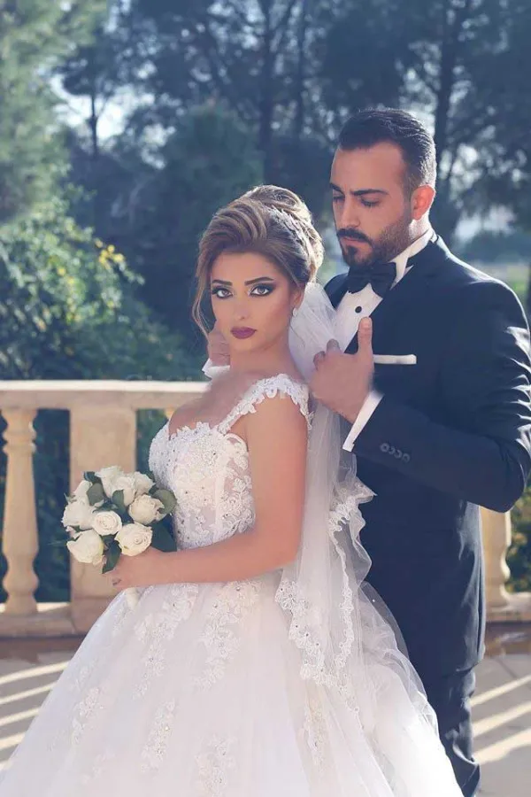 Splendido abito da ballo abito da sposa abiti da sposa arabo spose gonfie indossare illusione top spalline in pizzo trasparente perline cristalli applicazioni tulle