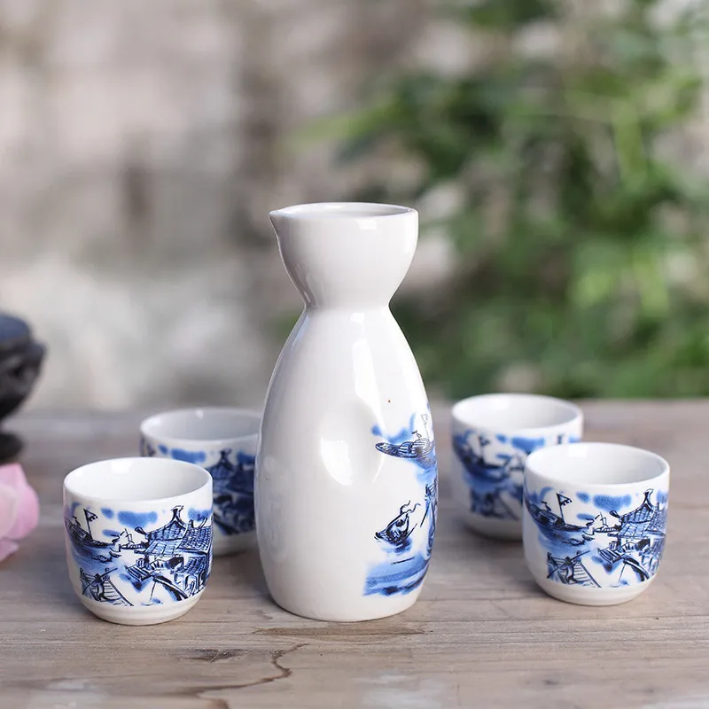 Japanese Glazed Ceramic Sake Set with Oriental Style Blue Ocean Waves Design Includes Serving Carafe and 4 Sake Cups