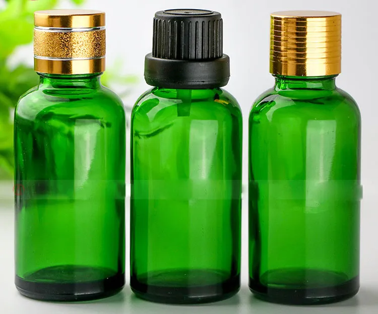 Botellas hotSelling 30ml vidrio verde con a prueba de niños Cap tapas roscadas aceite esencial cosmética vacía en botellas de vidrio con gotero 30ml de