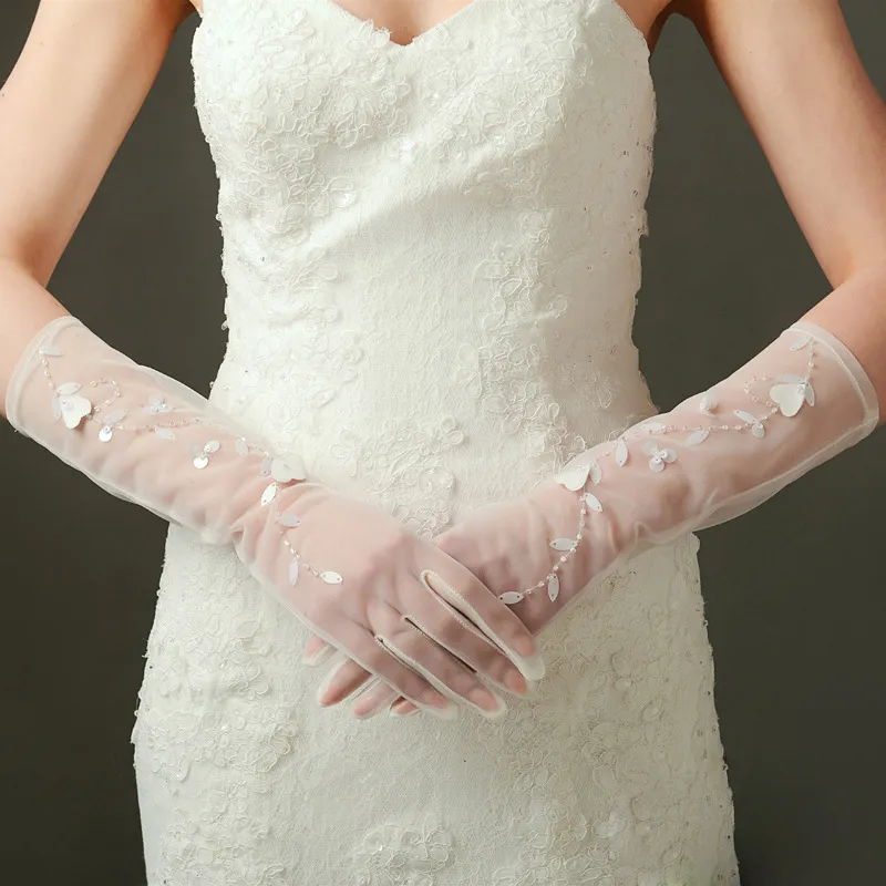 Ivory Bridal Gloves Sparking Beads Sequins Lång Bröllopshandskar Bröllop Tillbehör Ny Ankomst Gratis Frakt Fairy Style