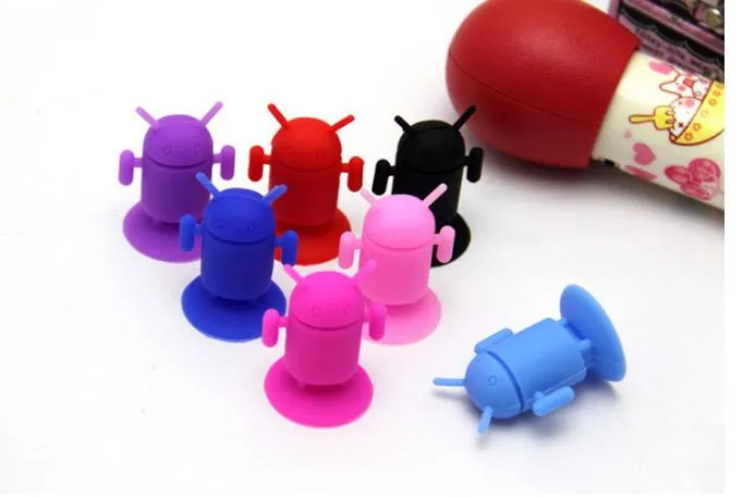 Ny Desgin Android Robot Mobiltelefon Hållare Monteras Sugkoppar Söt Hållare Silikon Sucker Bilhållare för alla Mobiltelefoner