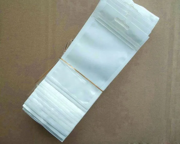 Groothandel 500 stks / partij Clear + White Plastic Rits Detailhandel Pakkettas voor datakabel Autolader mobiele telefoon accessoires Verpakking tas