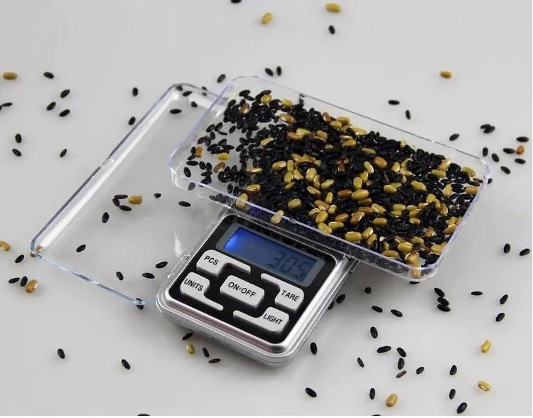 Balances numériques Balance de bijoux numérique Or Argent Pièce de monnaie Grain Gram Format de poche Herb Mini Rétroéclairage électronique 100g 200g 500g expédition rapide