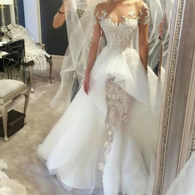 Zuhair Murad Abiti da sposa a sirena Illusion Pizzo Maniche corte Abiti da sposa arabi con girocollo trasparente Abiti in organza peplo